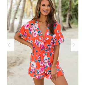 Brand new orange floral romper